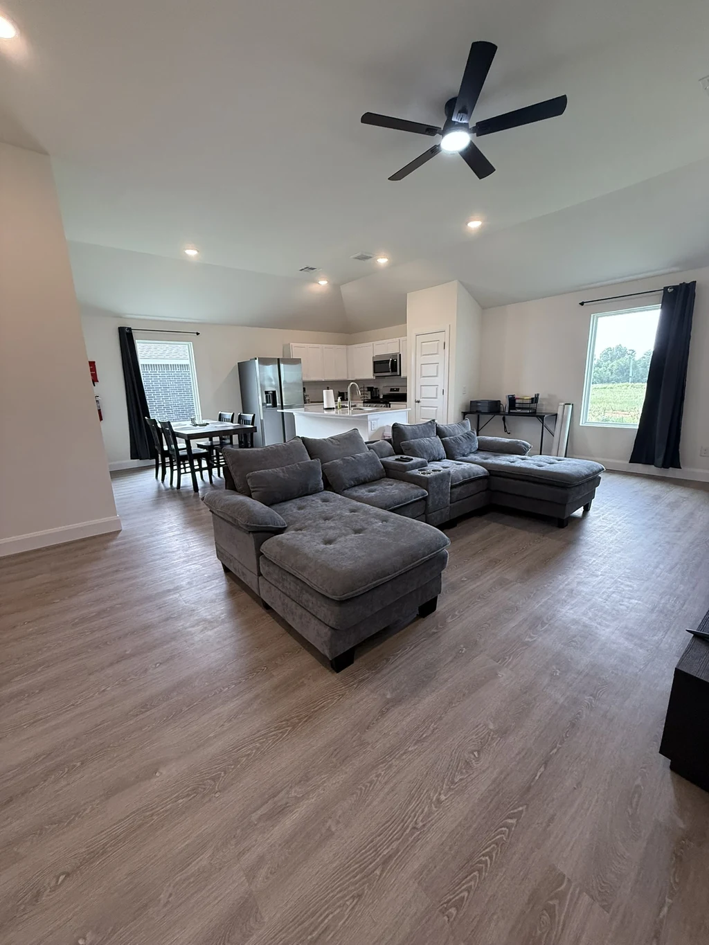 The real living room, kitchen, and shared spaces at Sam’s Place